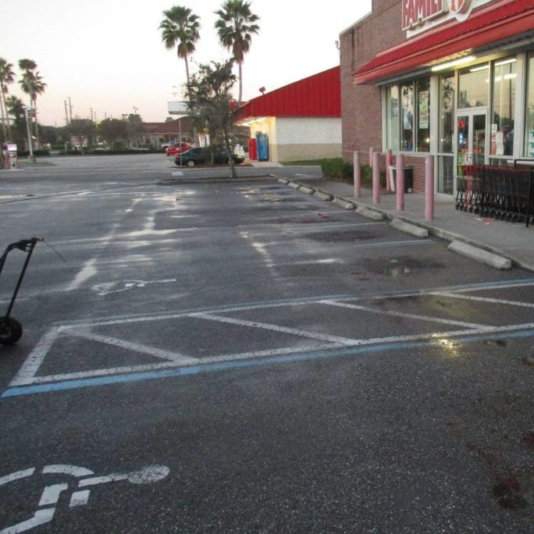 A parking lot that needs re-striping.