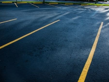 Learn whether to sealcoat or resurface your asphalt parking lot in Orlando, FL